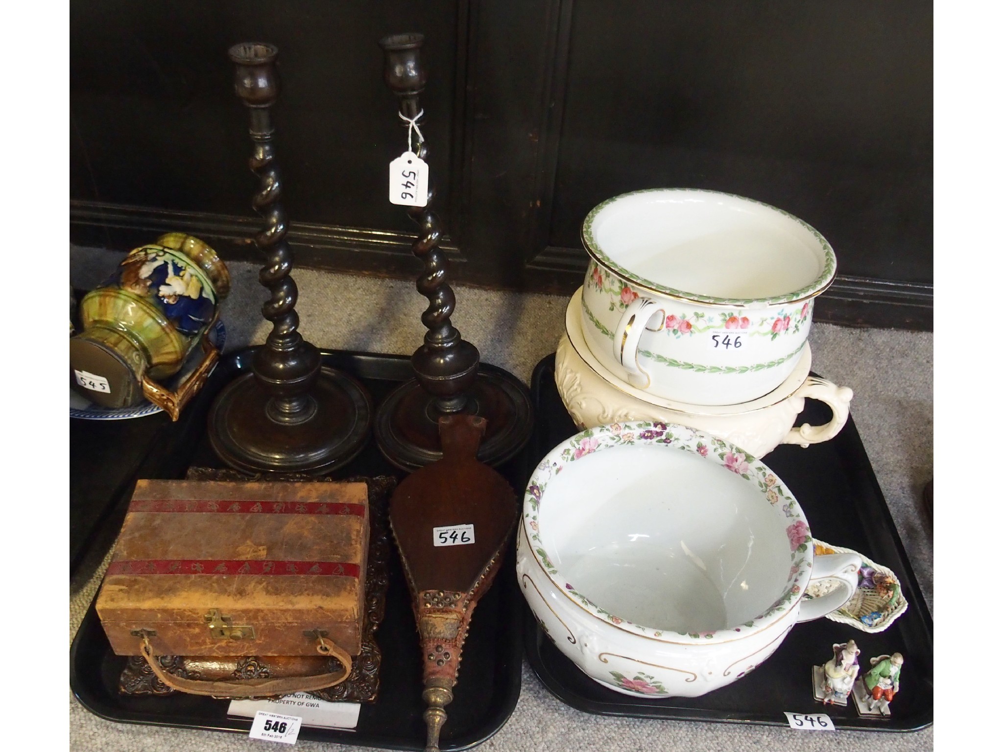 Appraisal: Pair of wooden barley twist candlesticks three pottery chamber pots