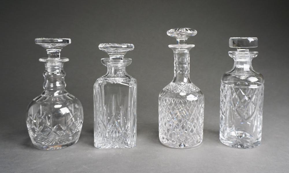 Appraisal: FOUR ASSORTED CUT AND MOLDED CRYSTAL DECANTERS INCLUDING WATERFORD AND