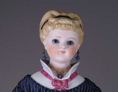 Appraisal: BEAUTIFUL GLASS-EYED PARIAN DOLL WITH MOLDED COLLAR Having blue glass