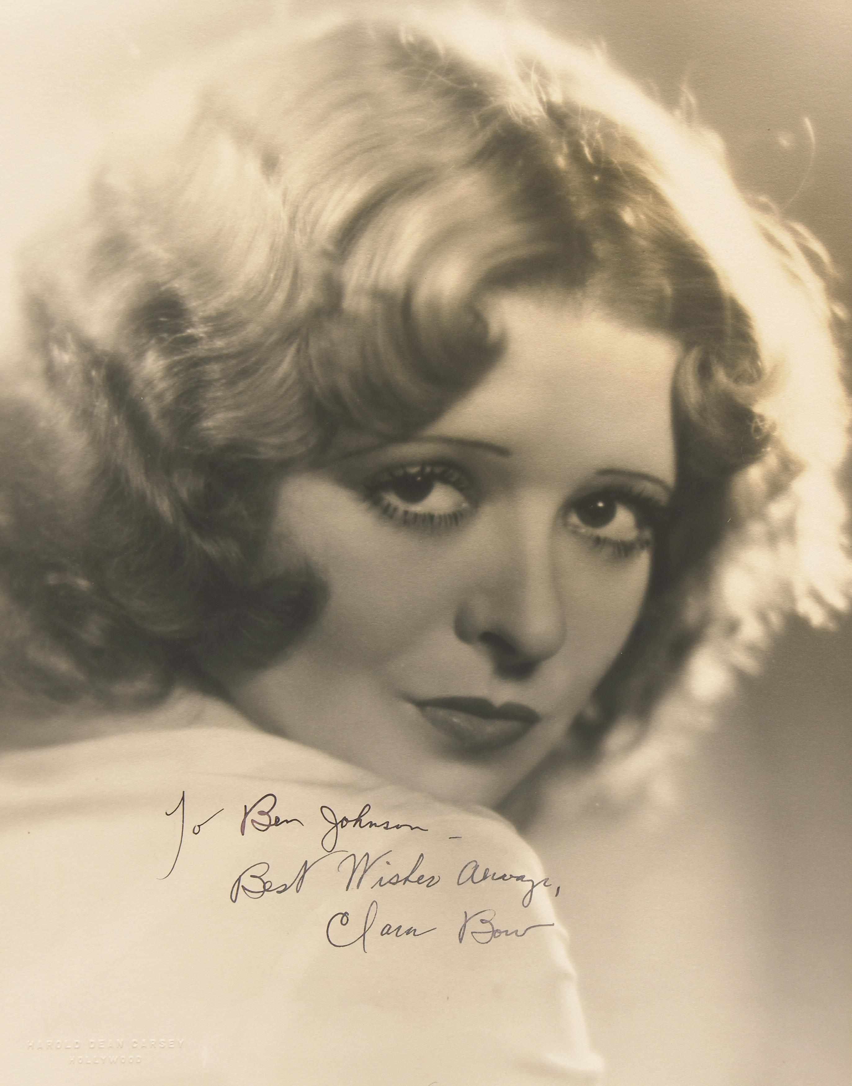 Appraisal: Clara Bow signed photograph A large vintage publicity portrait inscribed