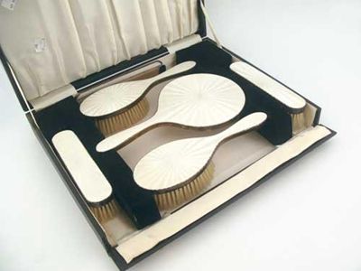 Appraisal: A cased modern six piece silvergilt mounted toilet set decorated