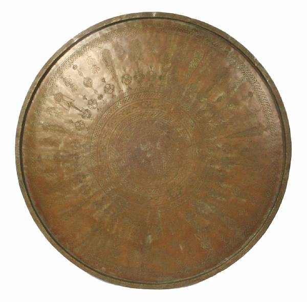 Appraisal: A Middle Eastern hammered copper tray depth in diameter in