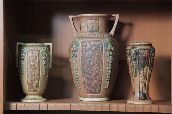 Appraisal: THREE ROSEVILLE POTTERY VASES All in brown Florentine pattern ''