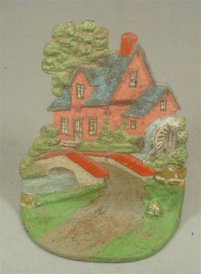 Appraisal: Cast iron doorstop colorful watermill house with bridge and landscape