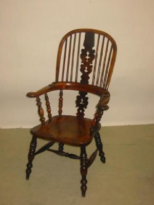 Appraisal: A NORTH COUNTRY YEW WINDSOR ARM CHAIR of high hoop