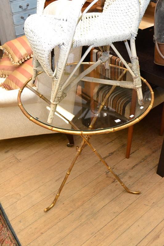 Appraisal: A GLIT FAUX BAMBOO TRIPOD BASED CIRCULAR TABLE WITH GLASS