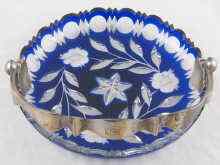 Appraisal: A Latvian blue overlay cut glass dish with heavy silver