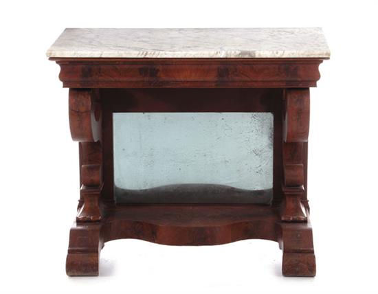 Appraisal: Classical mahogany and marbletop pier table circa scrolling supports mirrored