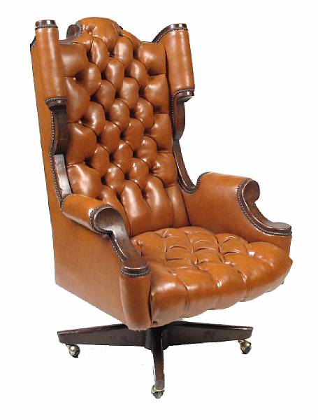 Appraisal: A monumental leather upholstered swivel desk chair height ft in