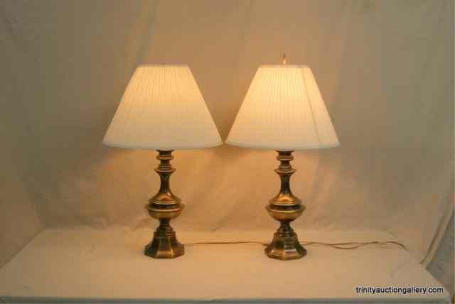 Appraisal: Pair of Matching Vintage Solid Brass Table LampsThis is a