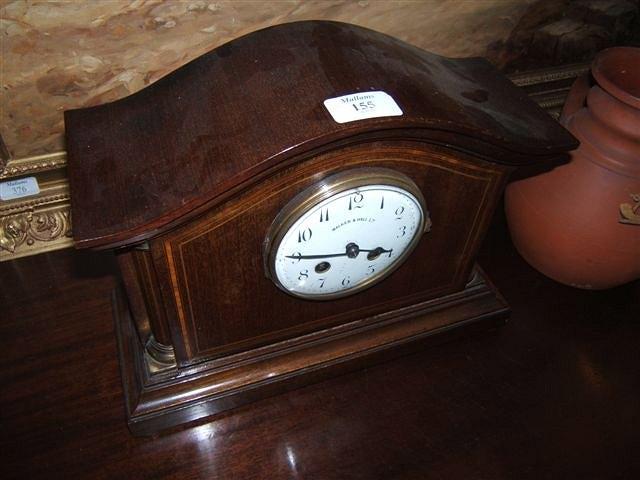 Appraisal: An Edwardian mahogany cased mantel clock the enamelled dial with