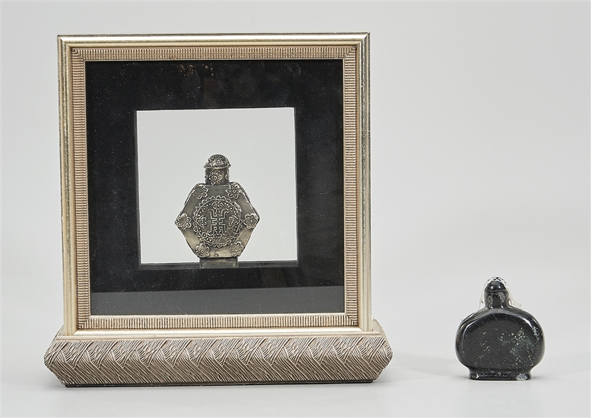 Appraisal: Two Chinese snuff bottles one in glass frame the other