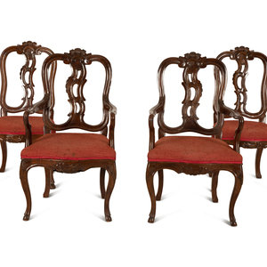 Appraisal: A Suite of Fourteen Italian Baroque Style Walnut Dining Chairs