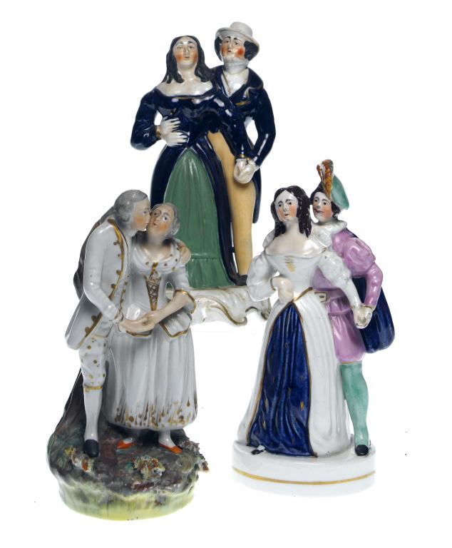 Appraisal: TWO STAFFORDSHIRE GROUPS OF DANCERS AND A SIMILAR GROUP painted