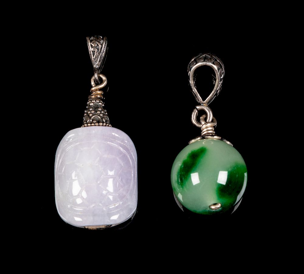 Appraisal: Two Chinese Jadeite Pendants Larger width cm cm Two Chinese