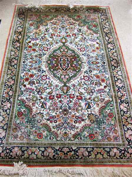 Appraisal: HAND KNOTTED ORIENTAL FAUX SILK CARPET Indo-Persian colorful floral and