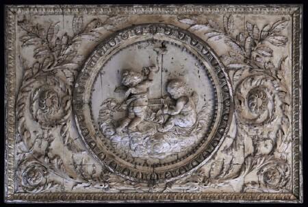 Appraisal: FRENCH LIMEWOOD OAK AND MAHOGANY RELIEF-CARVED PANEL The central rondel