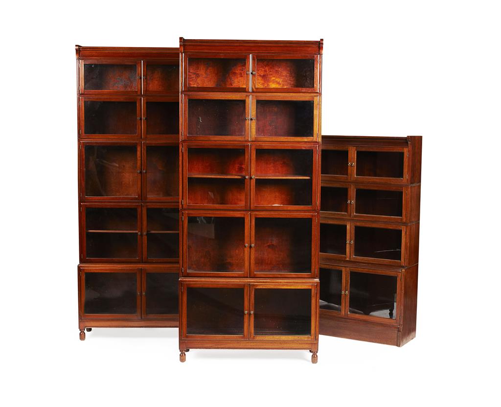 Appraisal: THREE MAHOGANY GLOBE WERNICKE STYLE STACKING BOOKCASES EARLY TH CENTURY