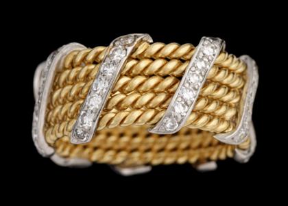 Appraisal: karat yellow gold and diamond bandin the manner of schlumberger