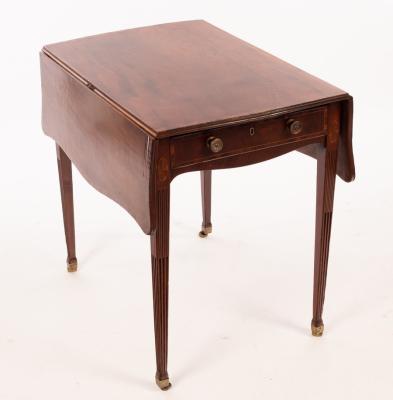 Appraisal: A George III mahogany butterfly top Pembroke table crossbanded throughout