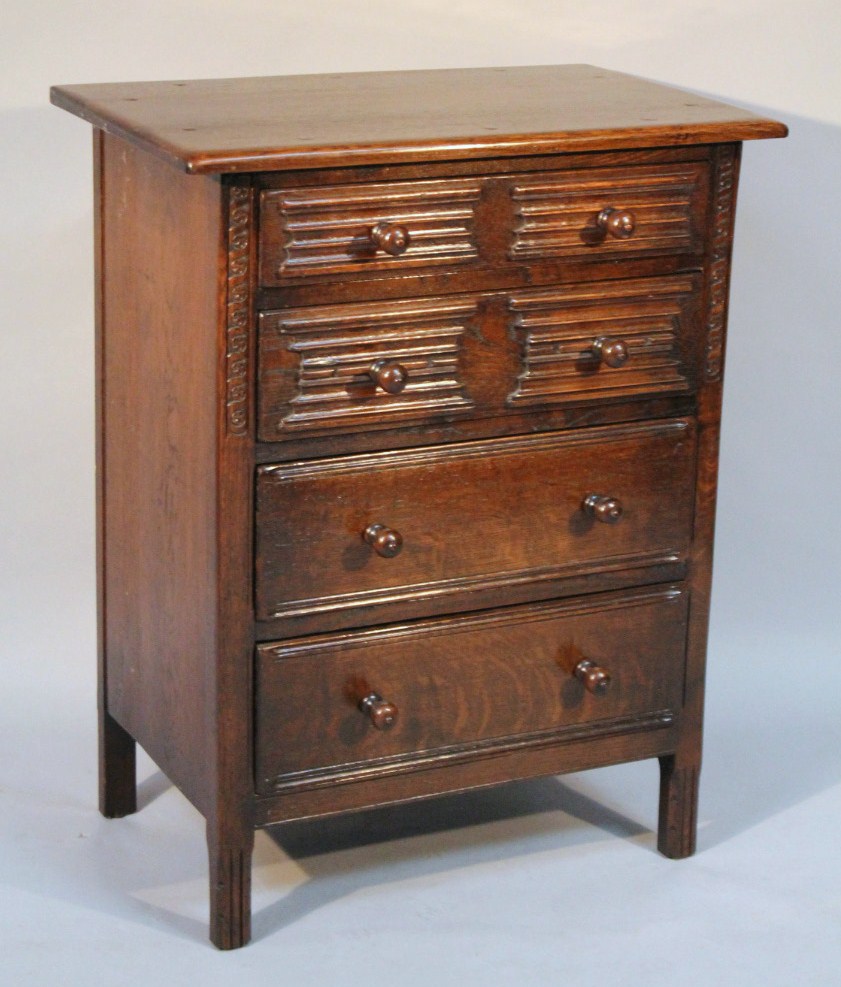 Appraisal: A thC oak finish Ercol style side cabinet the rectangular