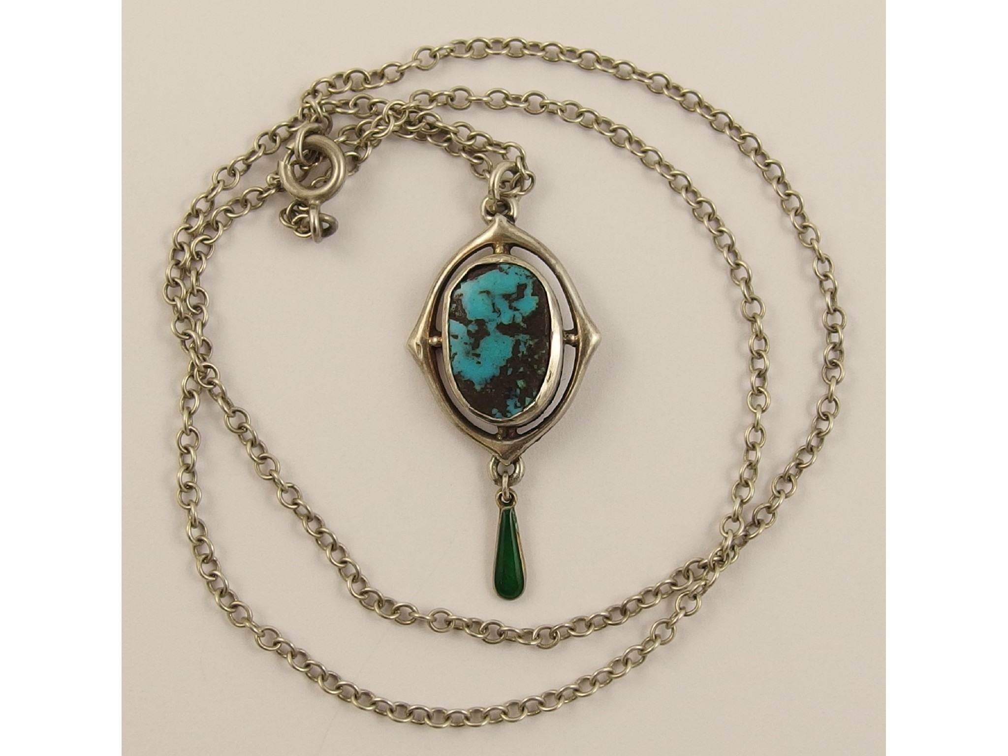 Appraisal: A silver Charles Horner pendantthe centre set with a turquoise