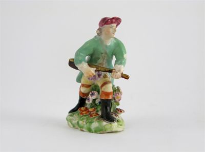 Appraisal: A miniature Chelsea figure of a hunter stalking his prey