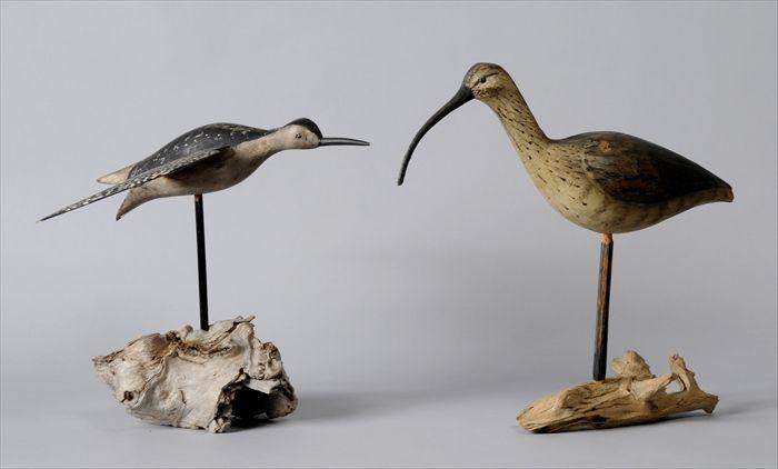 Appraisal: TWO CARVED MODELS OF BIRDS The taller signed Bundick in