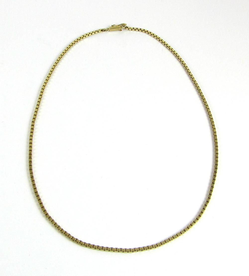 Appraisal: FOURTEEN KARAT YELLOW GOLD BOX CHAIN measuring in length weighing