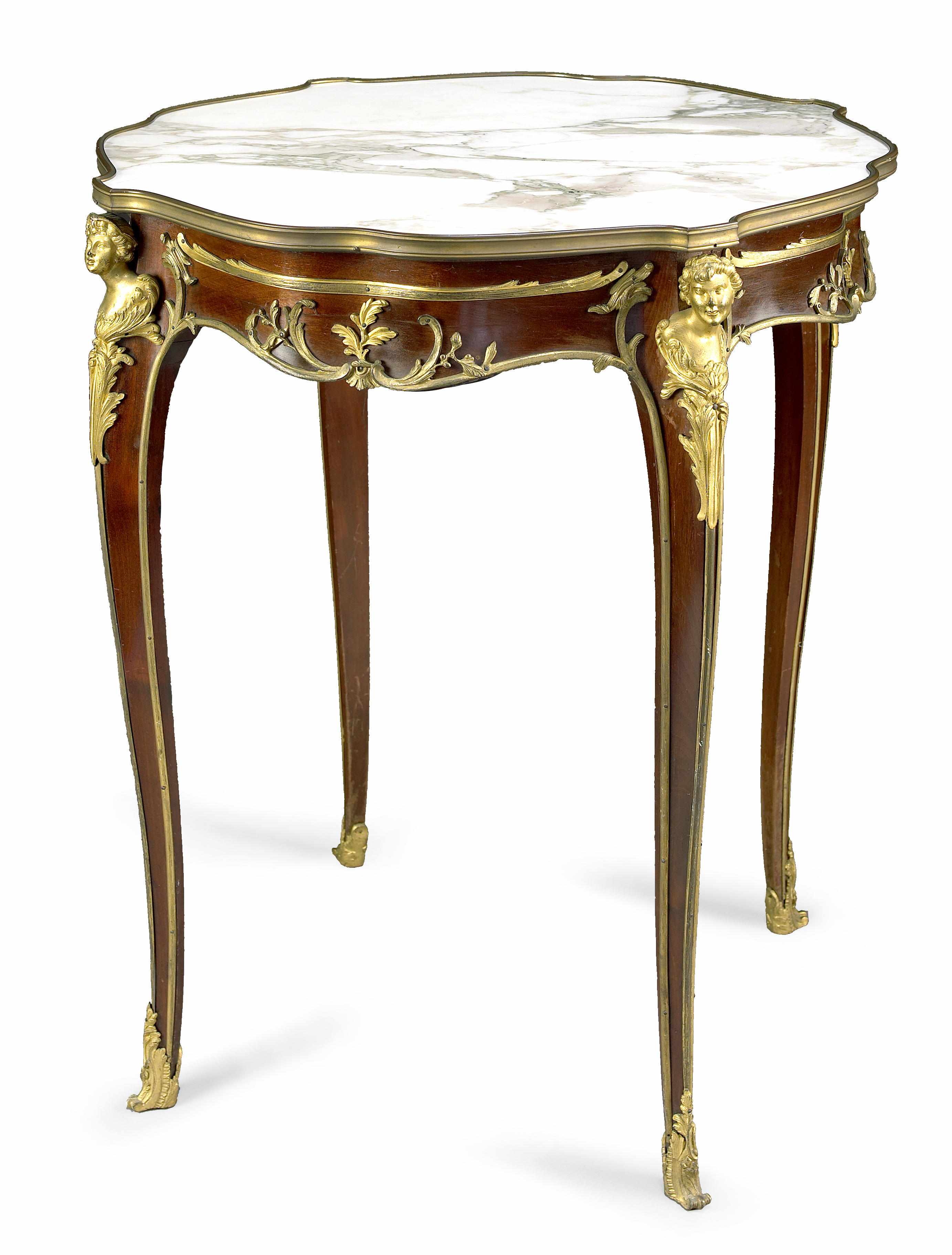 Appraisal: A Louis XV style gilt bronze mounted mahogany table Franois