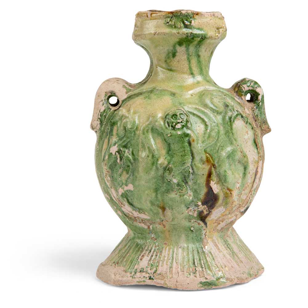 Appraisal: SANCAI-GLAZED BOTTLE VASE TANG DYNASTY the flattened globular body supported