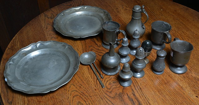 Appraisal: A collection of pewterto include two chargers various casters and