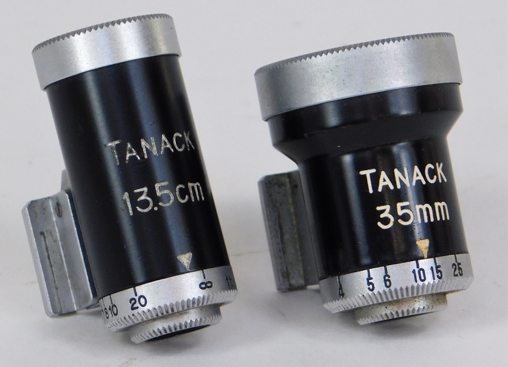 Appraisal: TWO CANON TANACK VIEWFINDERS Two Canon Tanack viewfinders mm and