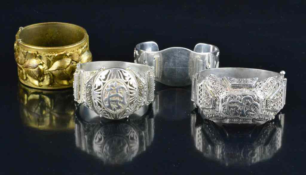 Appraisal: Mexican Islamic Silverplated BraceletsTo include two islamic silverplated filigree bracelets