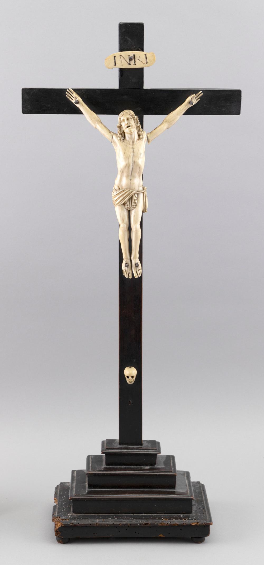 Appraisal: IVORY CRUCIFIX ON WALNUT STAND TH TH CENTURY HEIGHT WIDTH