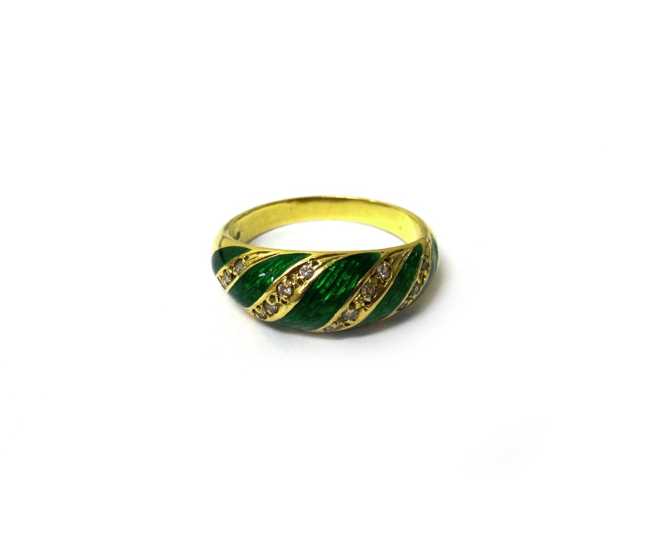 Appraisal: An ct gold and green enamelled ring mounted with rows