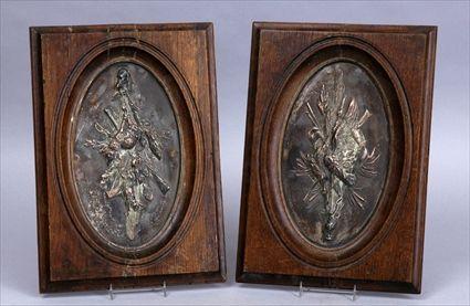 Appraisal: PAIR OF SILVER-ON-COPPER OVAL RELIEF HUNT TROPHIES Rendered after designs