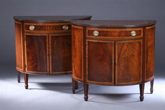 Appraisal: PAIR GEORGE III STYLE MAHOGANY DEMI-LUNE COMMODES th century With