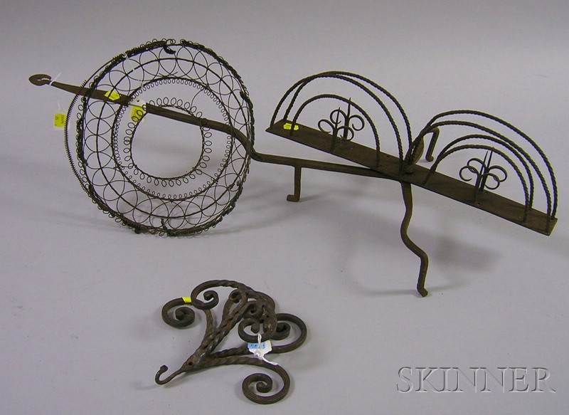 Appraisal: Wrought Iron Swivel Toaster Scrollwork Wall Hook and a Wire