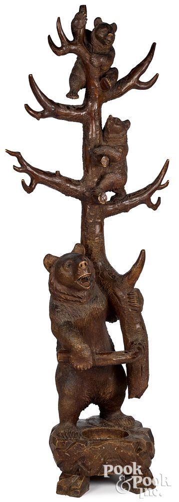 Appraisal: Black Forest carved bear tree umbrella stand Black Forest carved