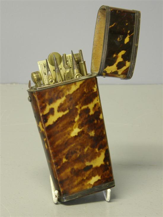 Appraisal: th century tortoiseshell cased compass set