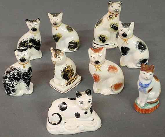 Appraisal: Nine th c Staffordshire cats tallest h