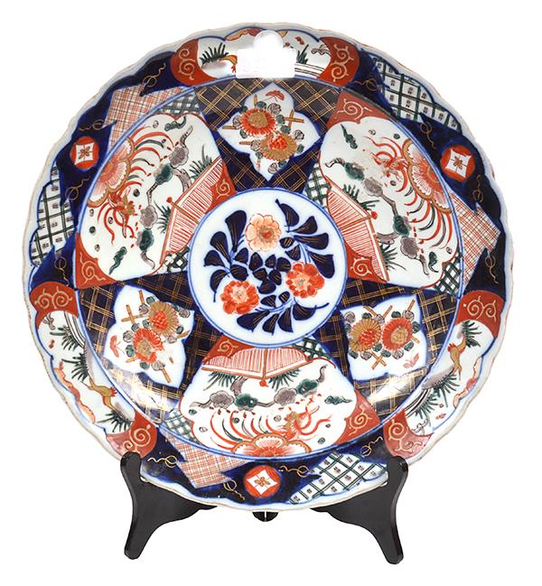 Appraisal: A JAPANESE IMARI DISH circular with floral panels on trellis