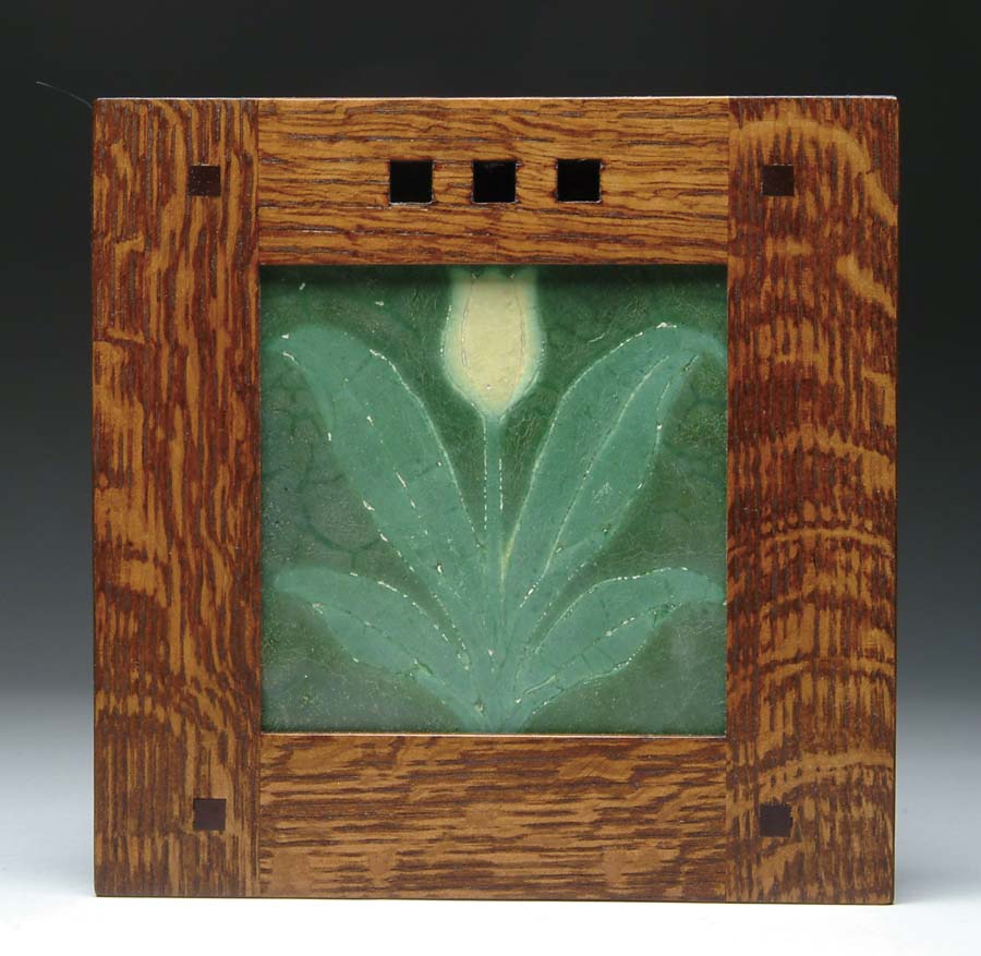 Appraisal: GRUEBY POTTERY TILE Wonderful pottery tile has green leaves and