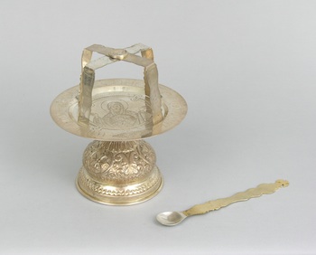 Appraisal: A Silver Paten Star and a Communion Spoon with a