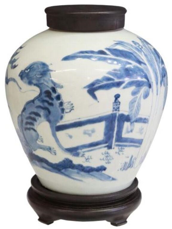 Appraisal: Chinese glazed porcelain lidded jar having tapered body blue glaze