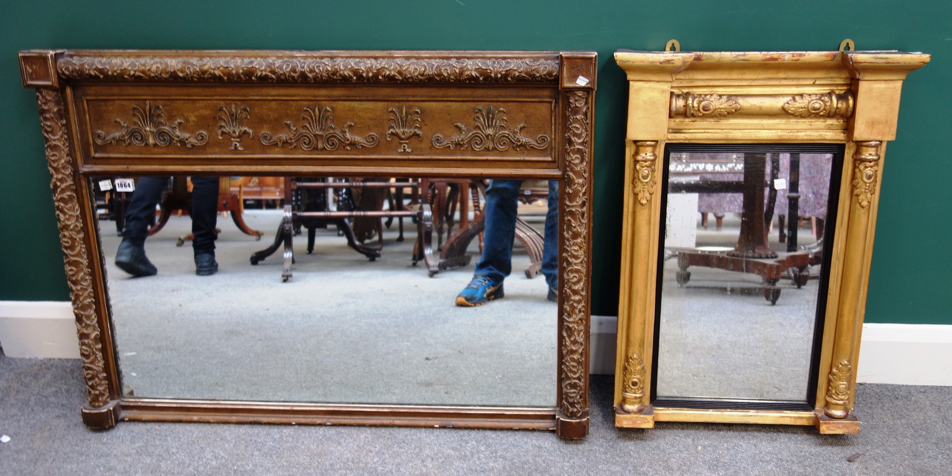 Appraisal: A th century gilt framed mirror with floral moulded columns