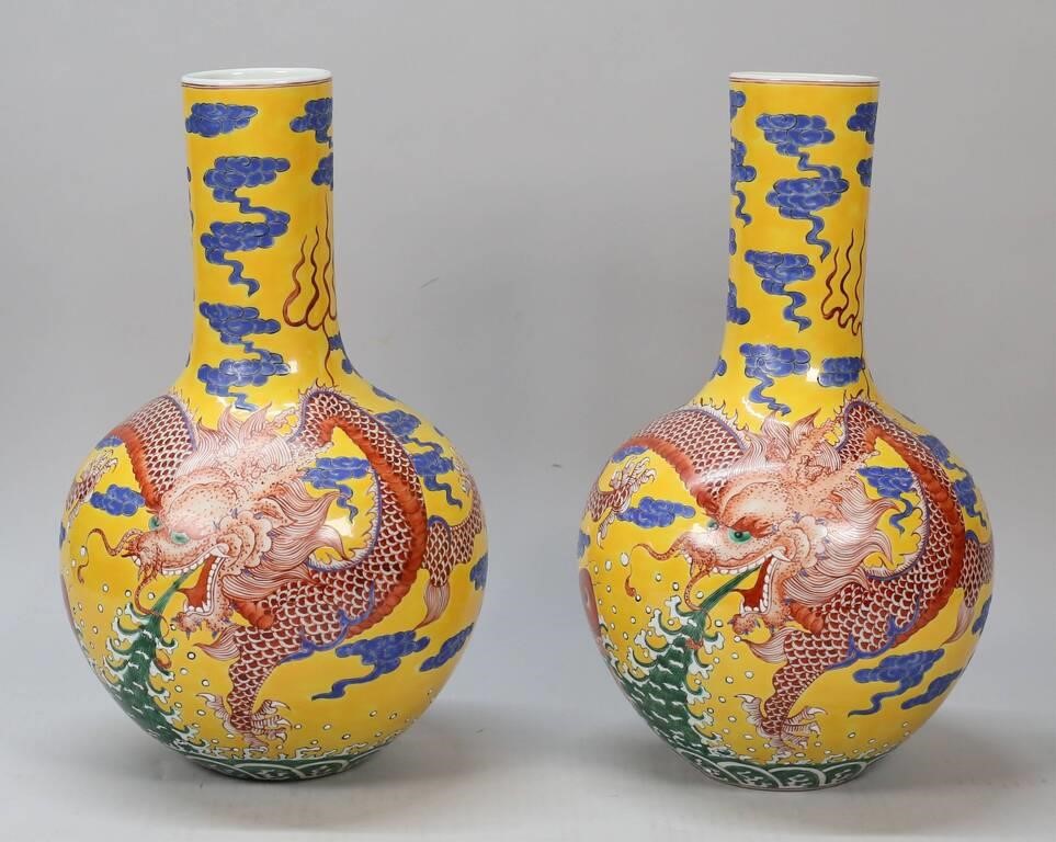 Appraisal: Pair of Chinese porcelain bottle form vases with enamel decorated