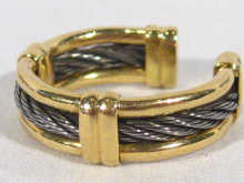 Appraisal: A hallmarked carat white and yellow gold rope twist design