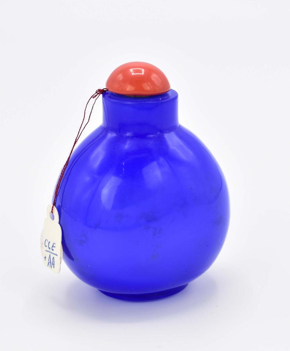 Appraisal: CHINESE PEKING BLUE GLASS SNUFF BOTTLEThe ovoid vessel with a